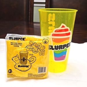 Yellow Slurpee cup w/Koozie